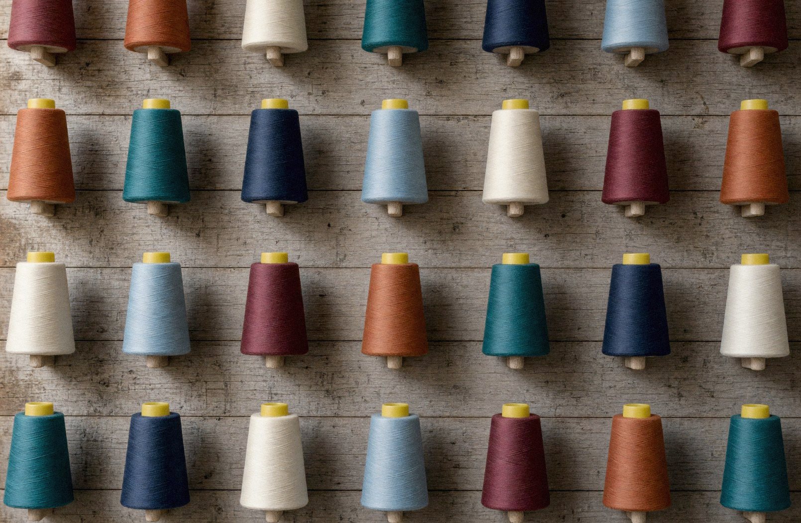 A wall of thread cones in the workshop